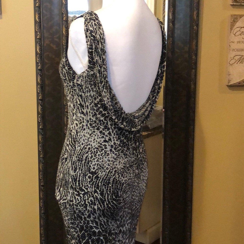Reduced-GORGEOUS CACHE GOWN WITH OPEN DRAPED BACK